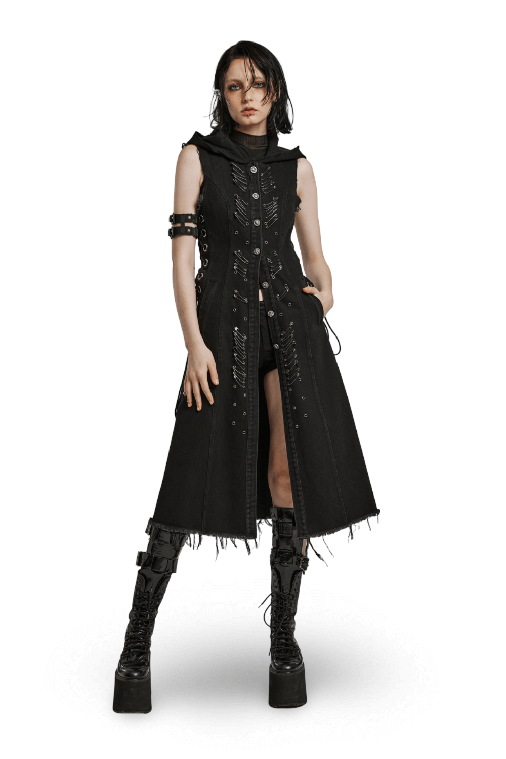 Edgy black denim hooded cape with punk safety pins and raw edging, showcasing a bold, stylish look.