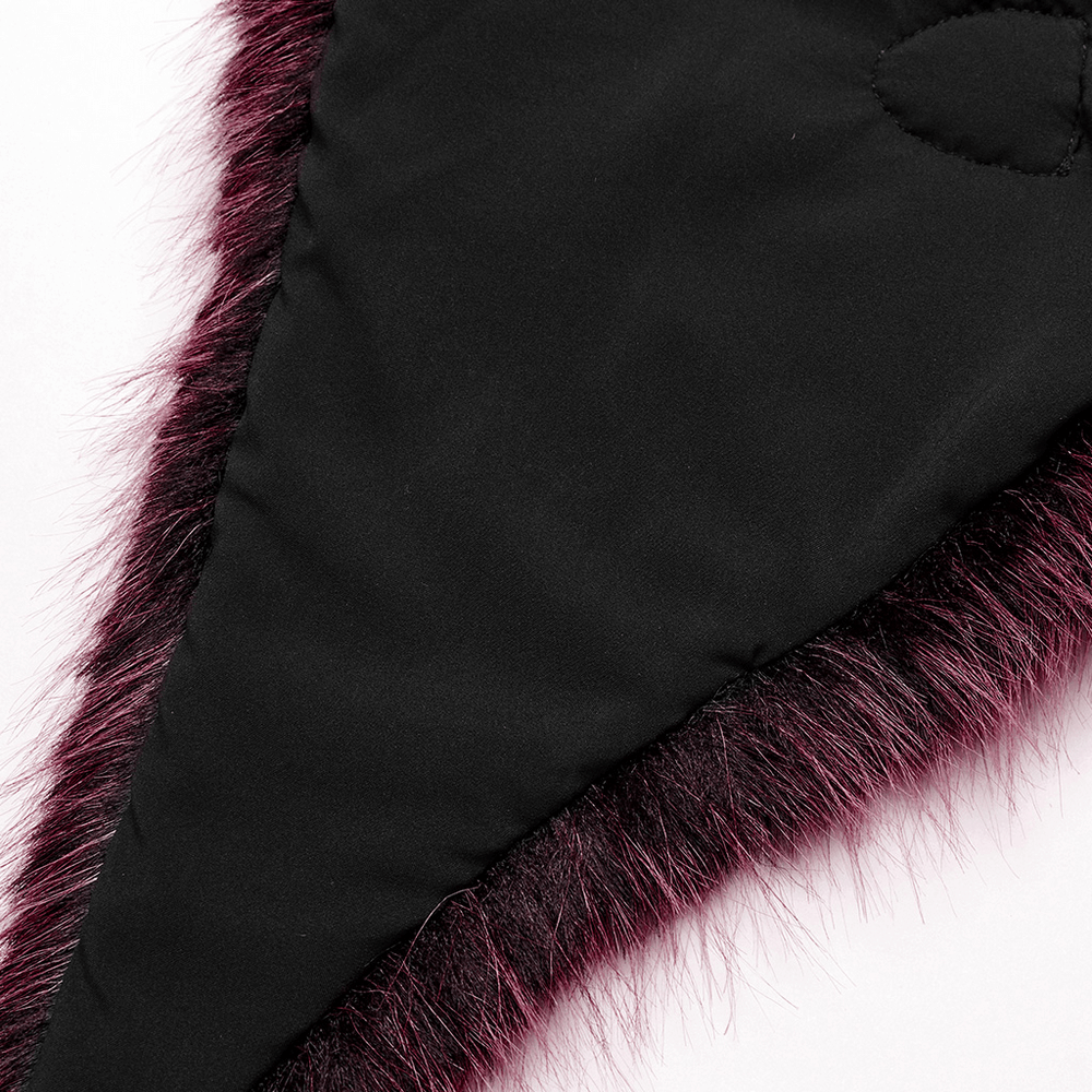 Close-up of the dual-tone devil cape showcasing soft fur and sleek leather details.