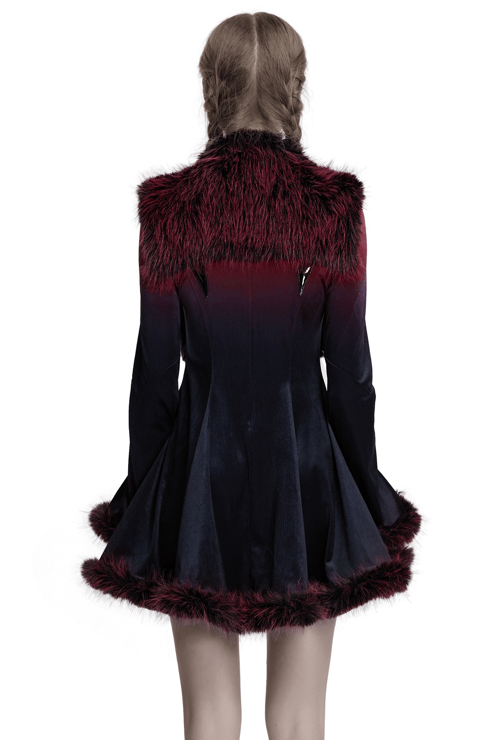 Back view of dual-tone devil fur cape with stand collar and leather accents, showcasing striking gradient and playful silhouette.