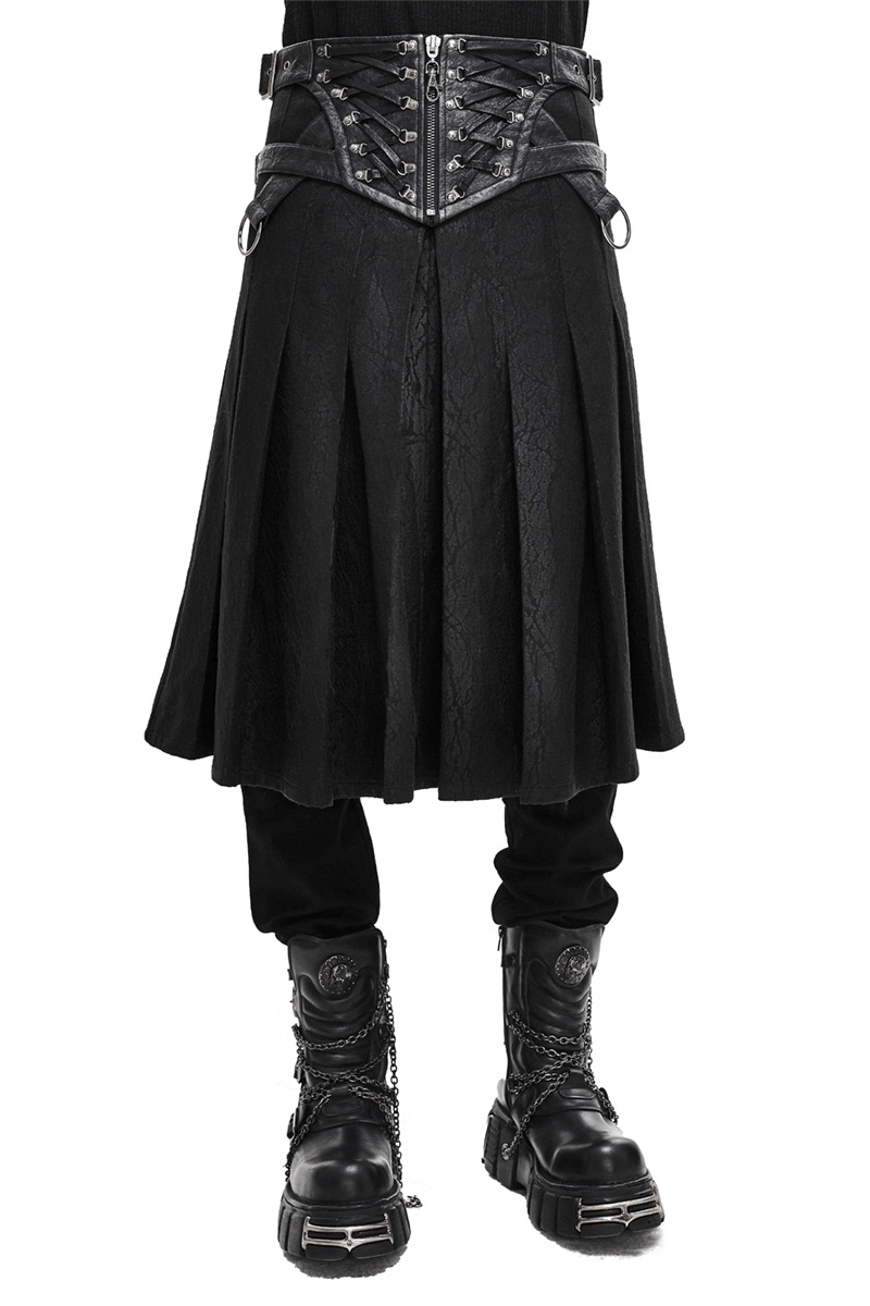 Men's black asymmetric kilt skirt with buckled leather straps, showcasing a gothic style and edgy fashion.