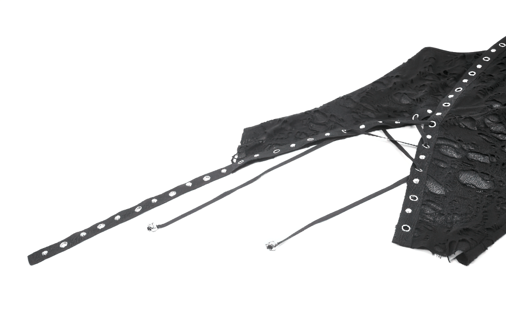 Gothic one-shoulder top with distressed texture and grommet straps, ideal for punk fashion enthusiasts.