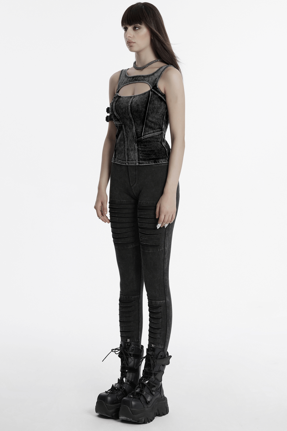 Distressed black denim tank top with cutout detail, perfect for punk and cyberpunk fashion enthusiasts.