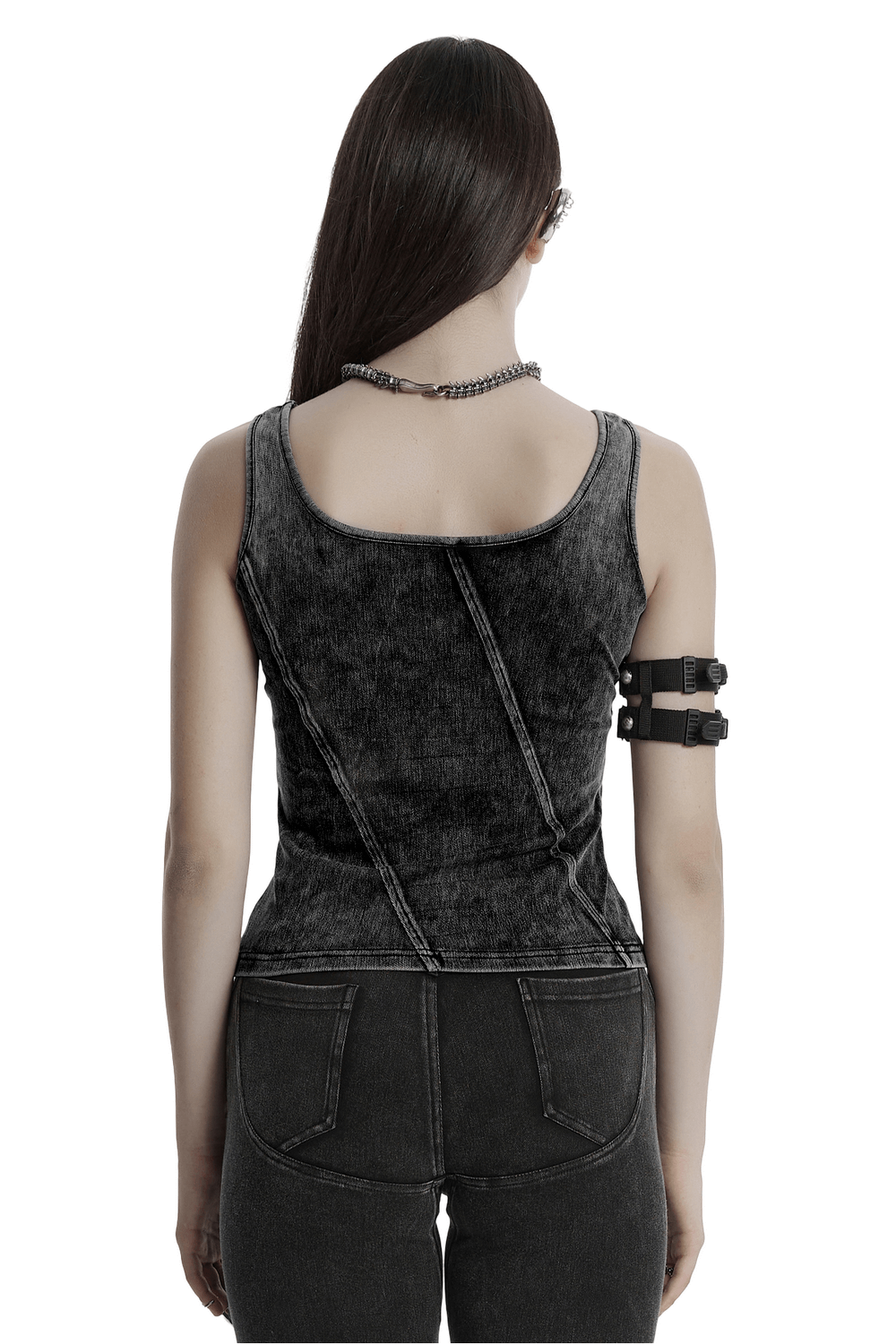 Back view of distressed black denim tank top with cutout detail showcasing punk-inspired design and asymmetrical stitching.