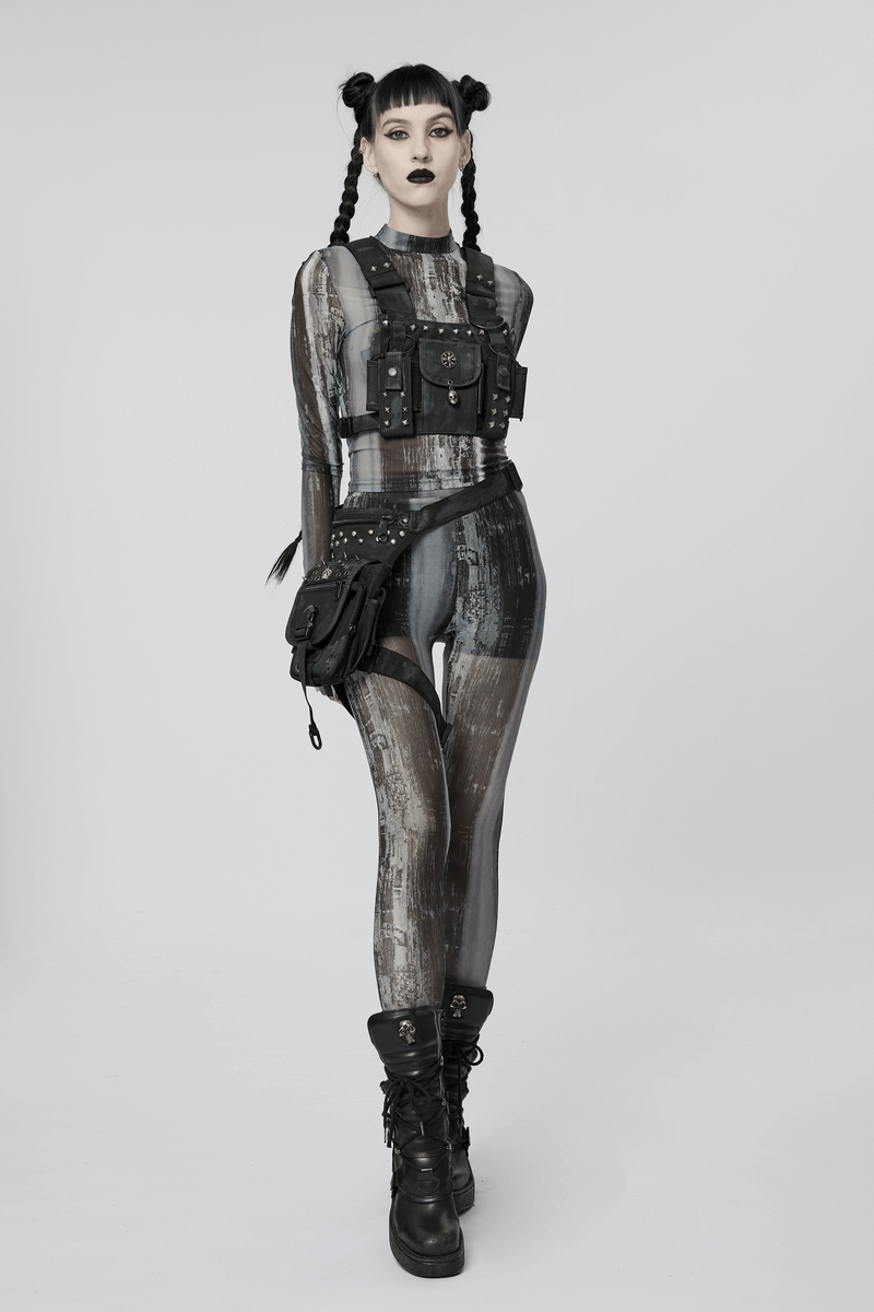 Model wearing distressed cyberpunk leggings and techwear harness in a post-apocalyptic fashion style.