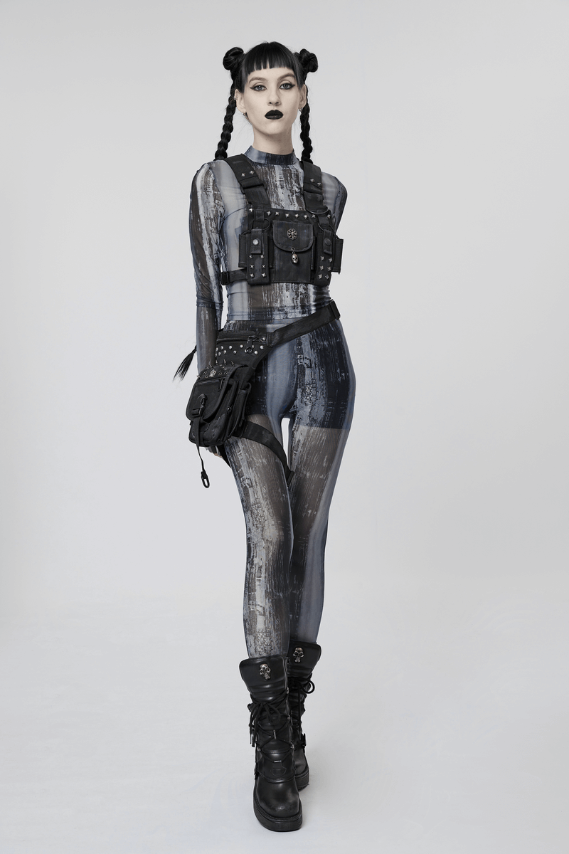 Model showcasing distressed cyberpunk leggings in mesh techwear style with edgy accessories and bold makeup.