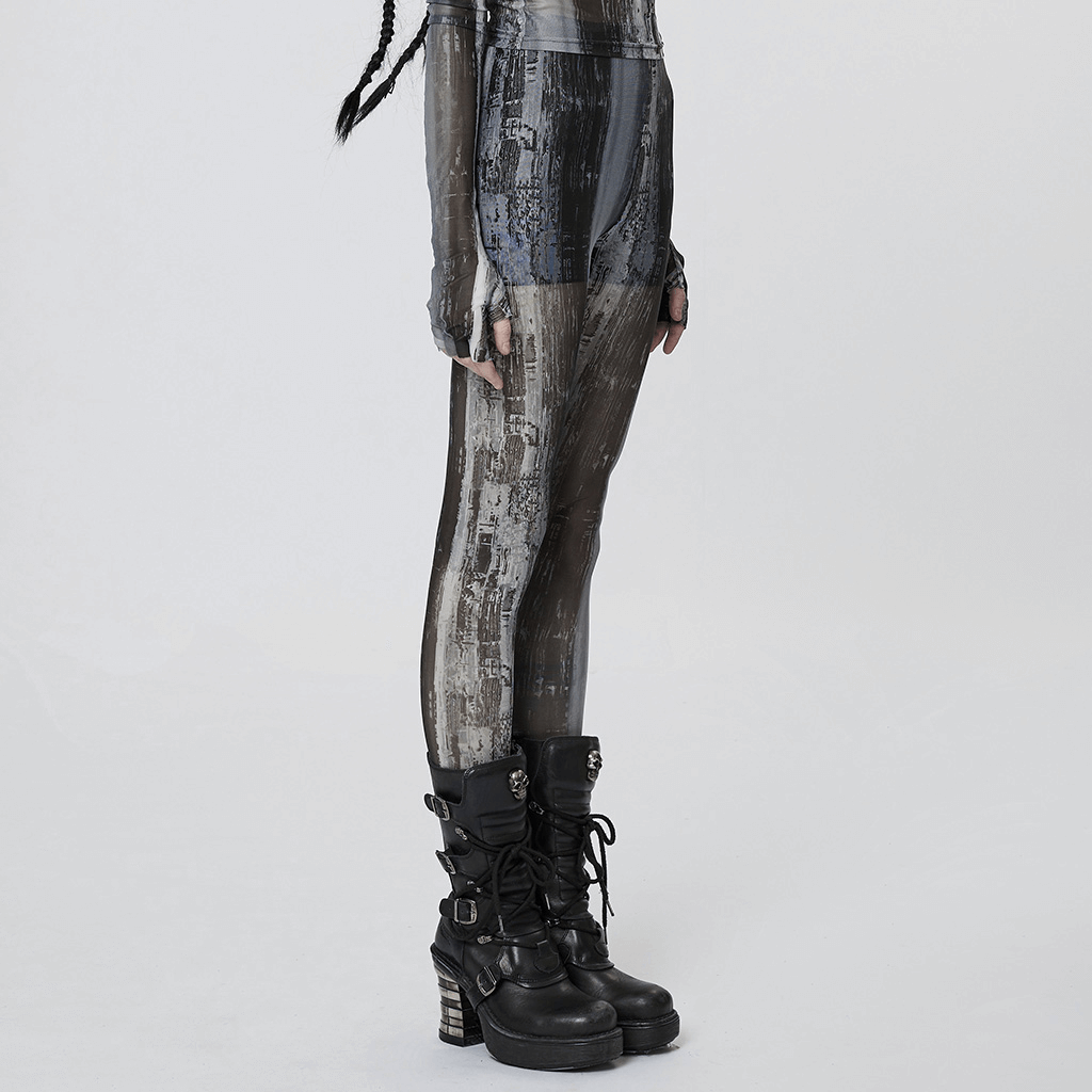 Side view of distressed cyberpunk leggings with techwear style and chunky black boots, embodying post-apocalyptic fashion.