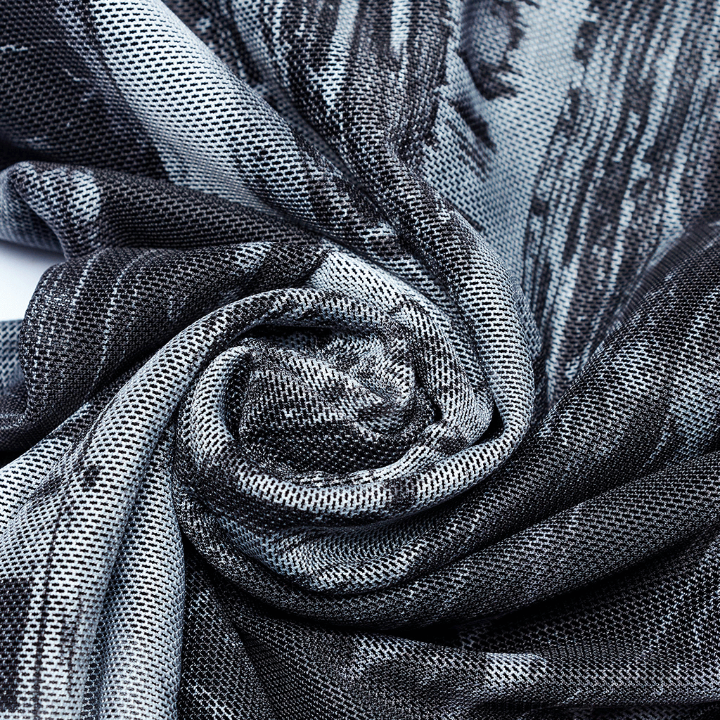 Close-up of distressed mesh fabric showcasing cyberpunk design and unique textures for techwear leggings.