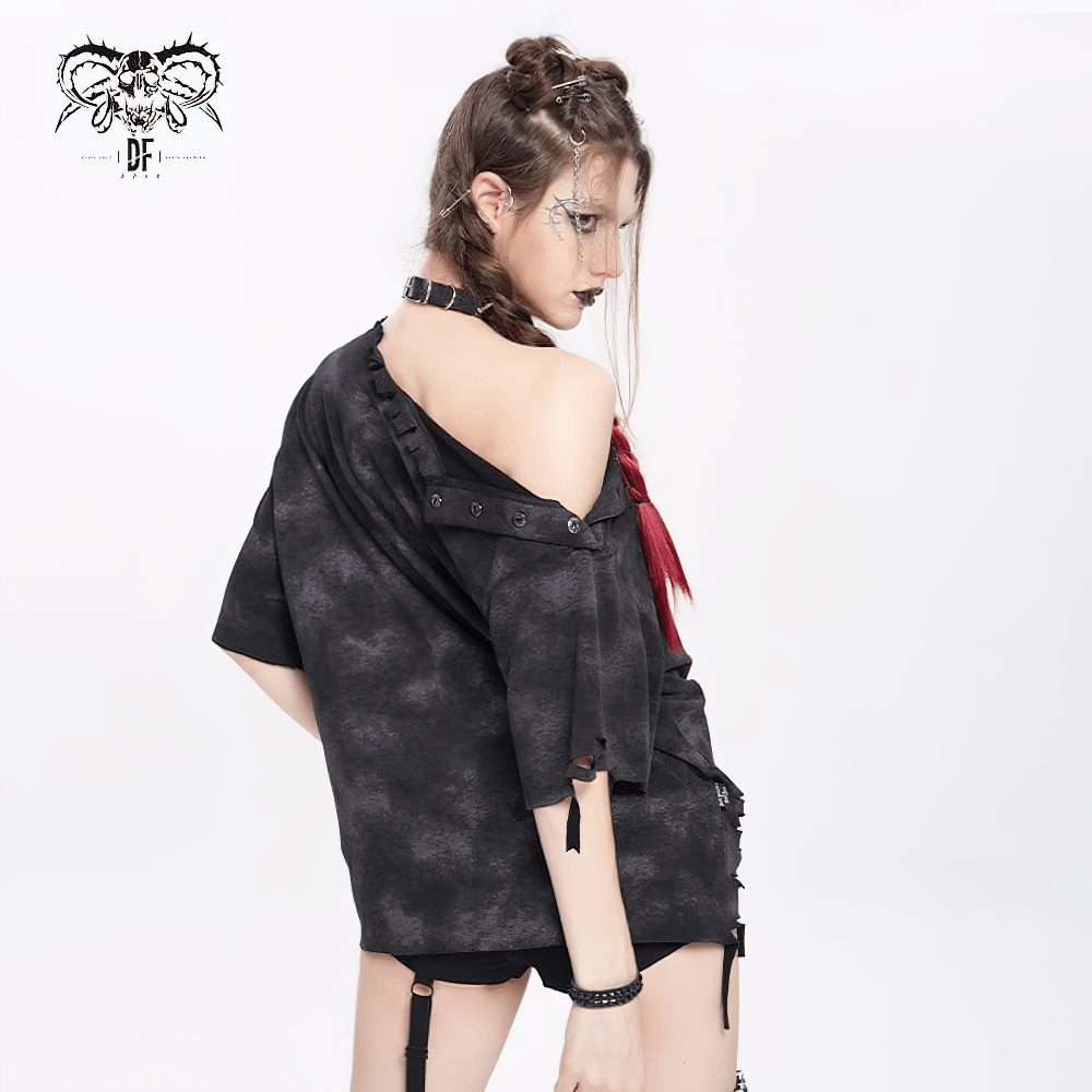 Model showcasing distressed demon graphic t-shirt with side ties in an edgy alternative style.