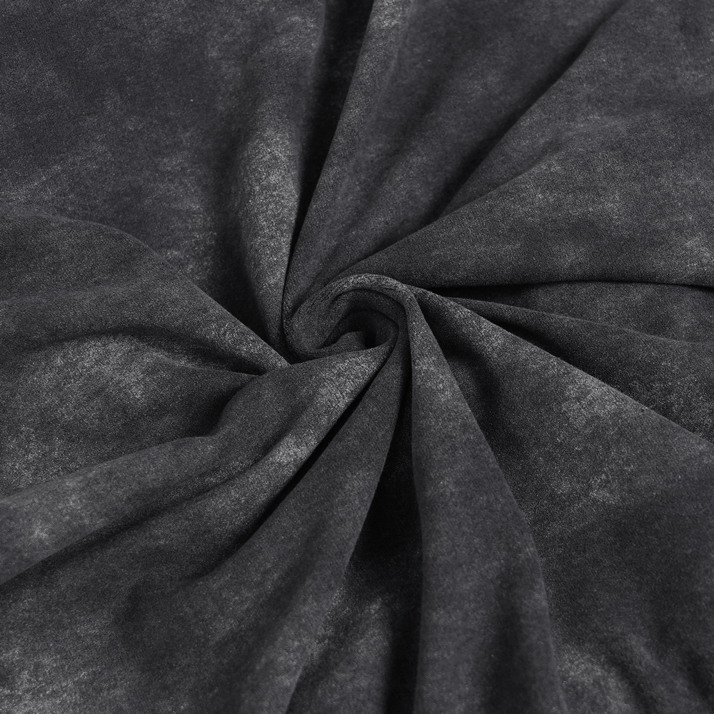 Close-up of textured black fabric showcasing a distressed look for edgy t-shirt designs.