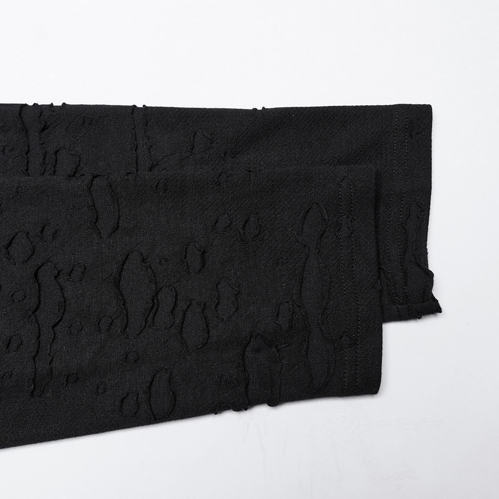 Distressed Gothic knit fabric close-up showing tattered texture and layered design in black, ideal for edgy punk-inspired outfits.