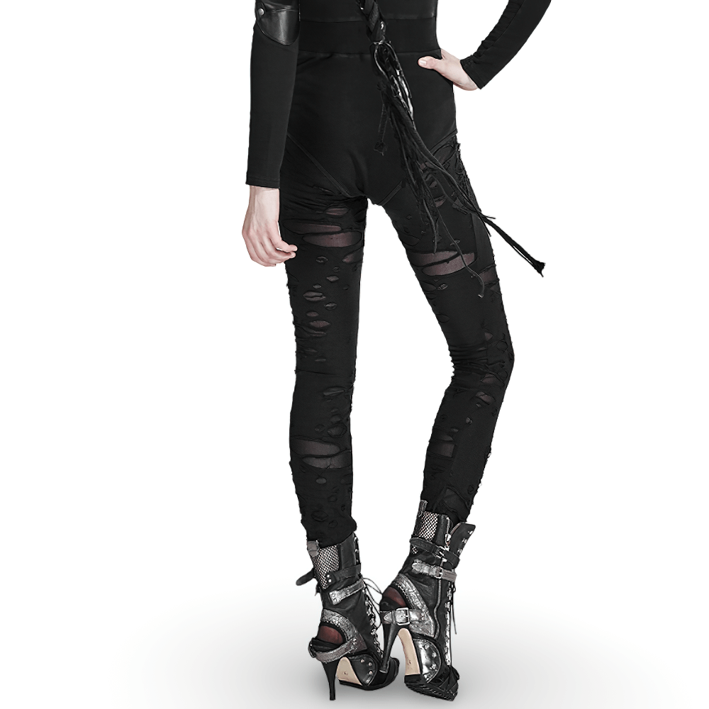 Women in distressed gothic mesh-panel leggings, showcasing a rebellious style with high-waisted cut and edgy ripped details.