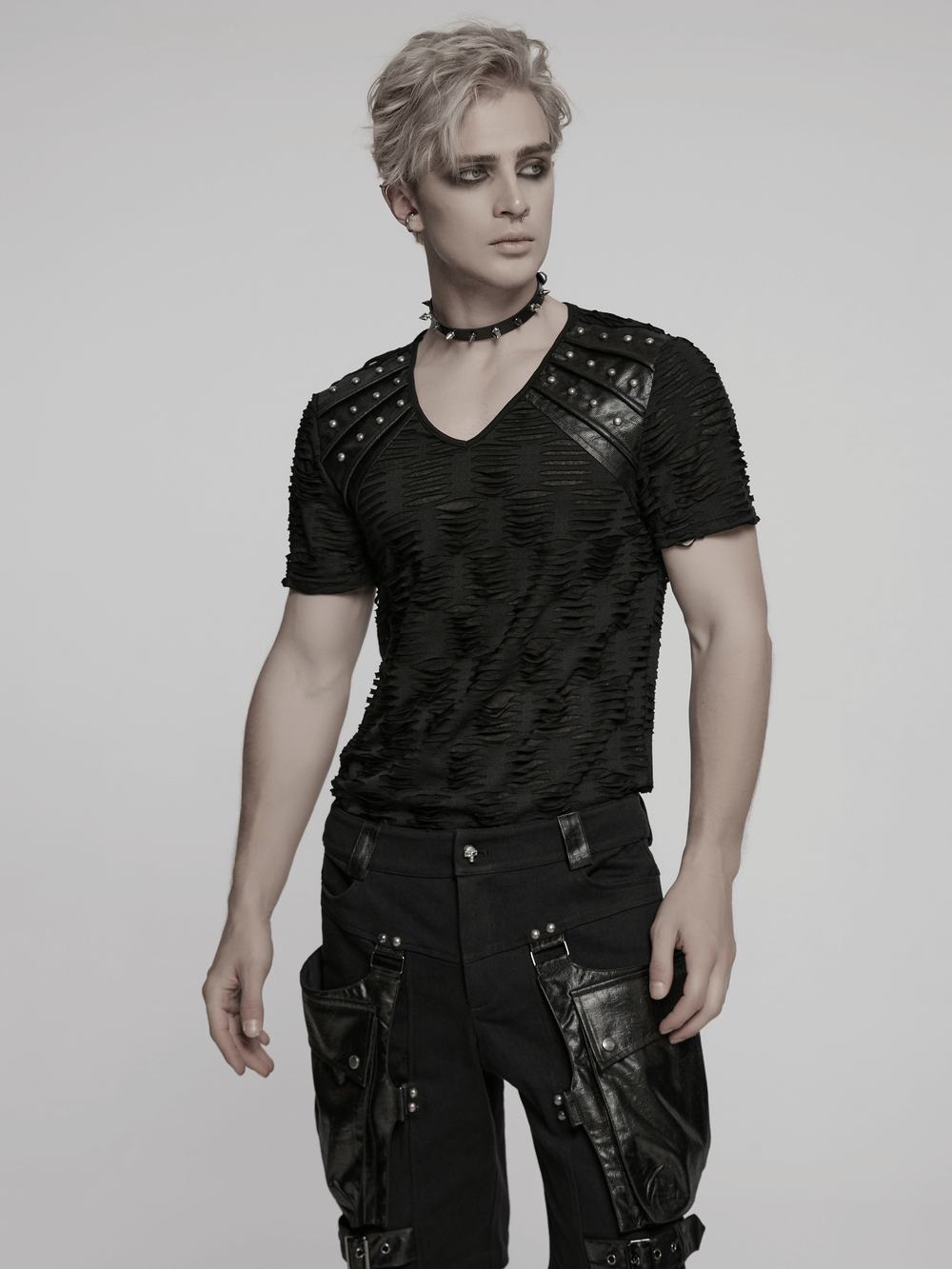 Stylish distressed gothic T-shirt with rivet shoulder detail for punk fashion lovers, showcasing bold alternative style.