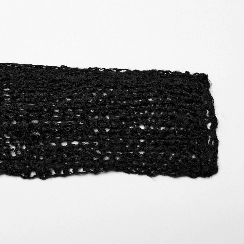 Textured black mohair fabric showcasing a distressed look for edgy apparel designs.