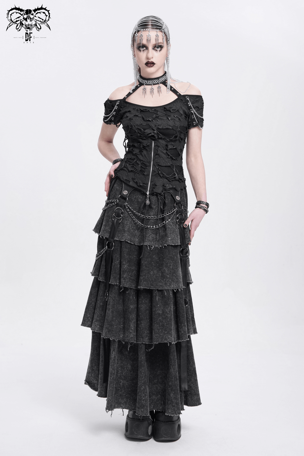 Punk distressed off-shoulder top with zipper and chain details, paired with a layered black skirt, creating an edgy gothic look.