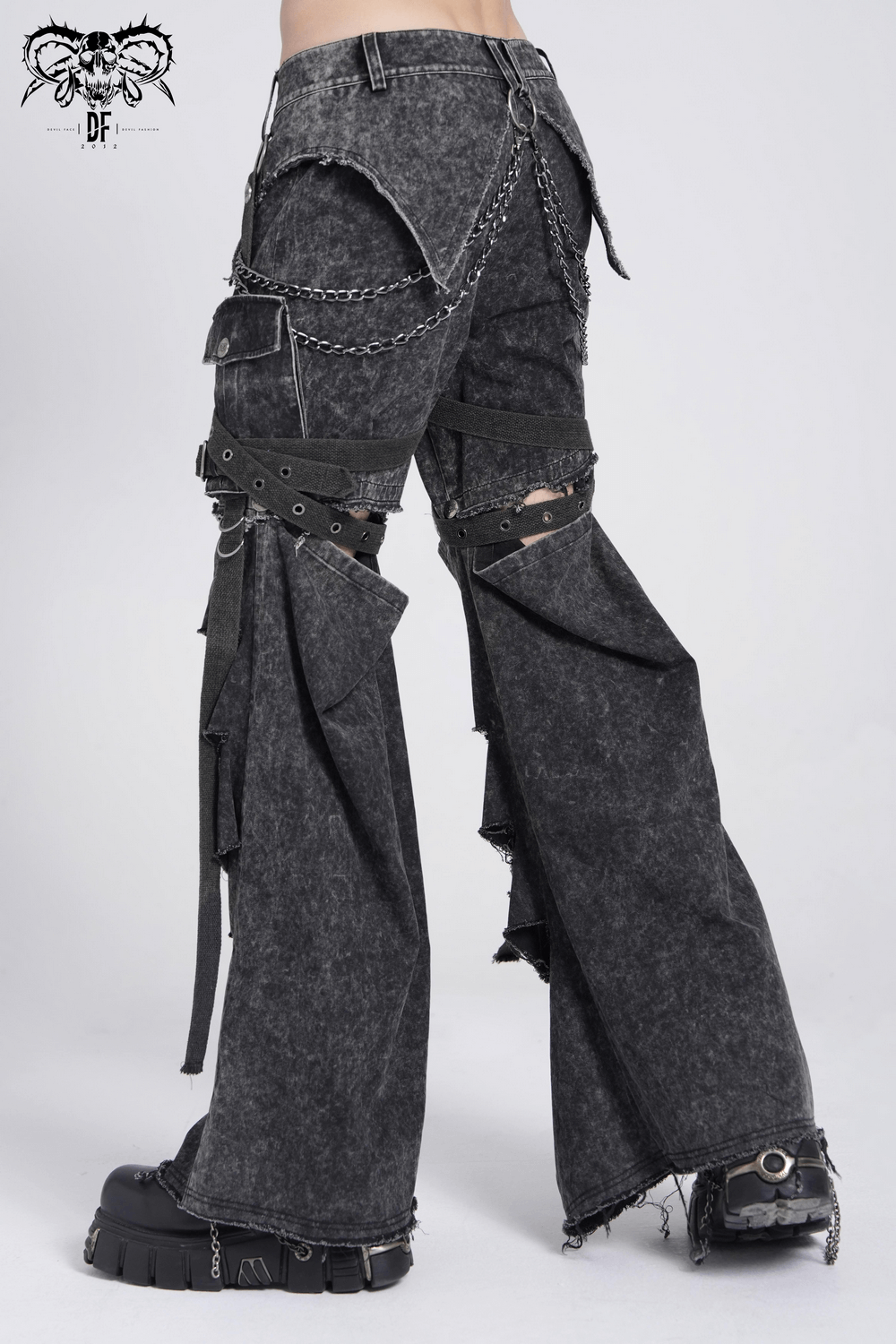 Men's distressed black flare pants with chains, buckles, and ripped details, perfect for punk fashion lovers.