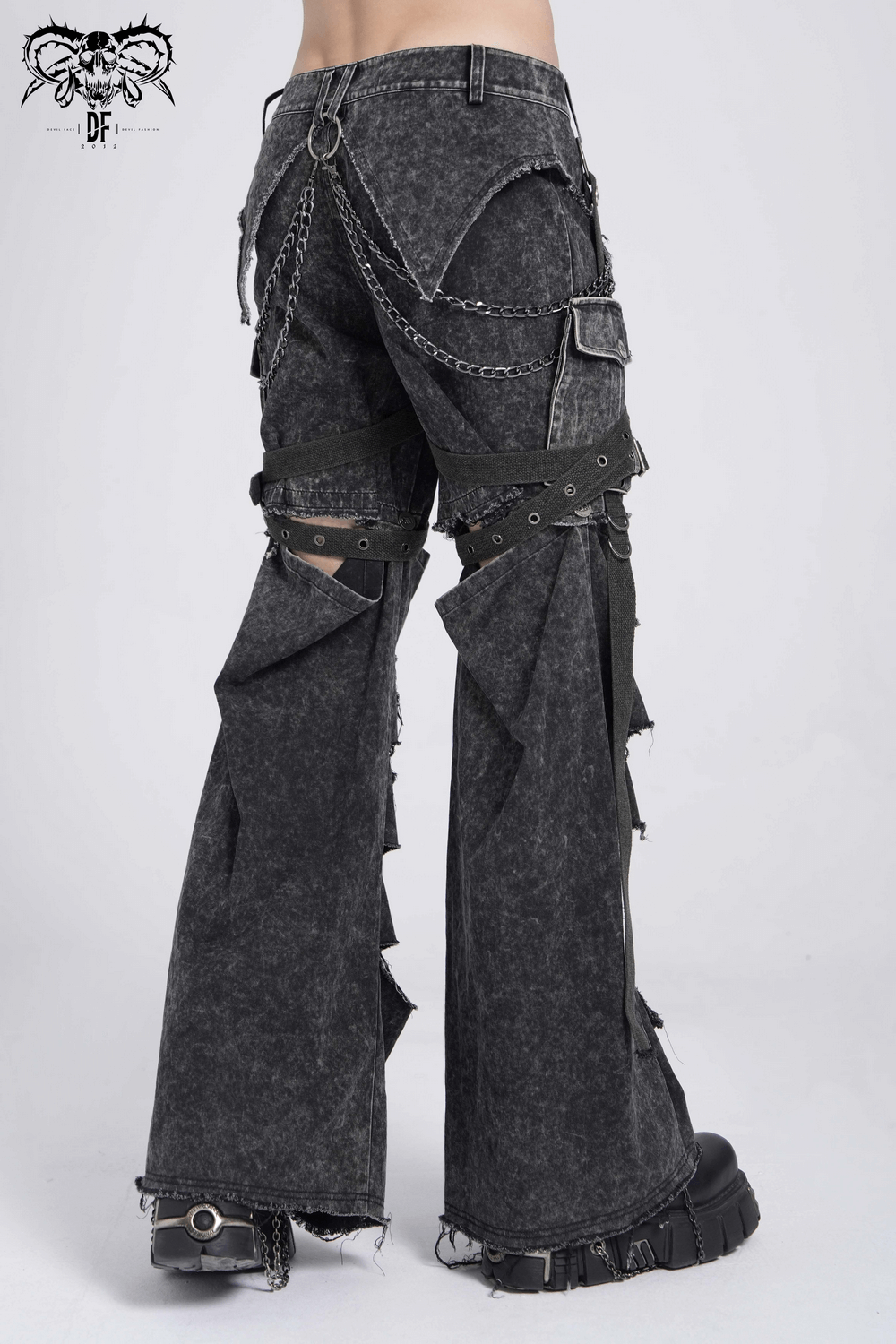 Men's distressed punk flare pants with chains and buckles, showcasing a ripped, edgy style for daring fashion.