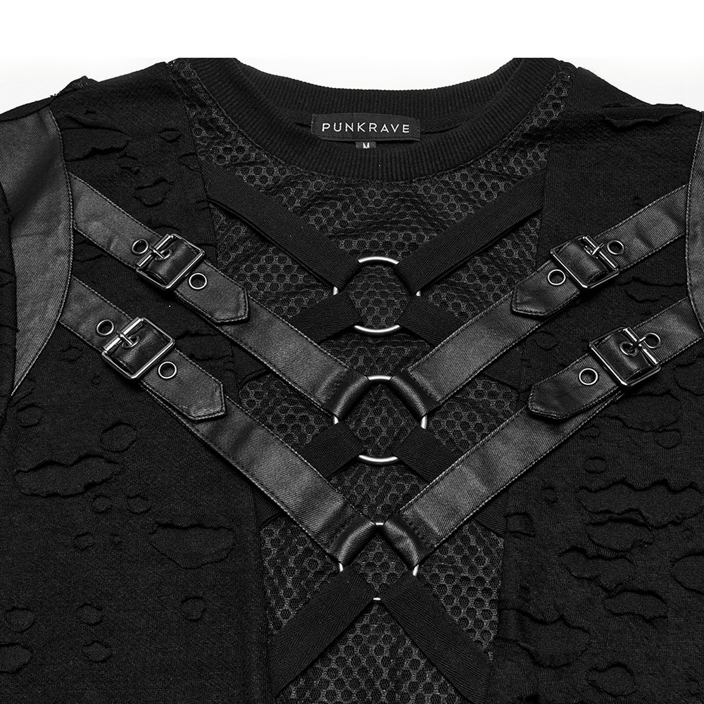 Close-up of distressed black punk t-shirt with leather straps and metal rings, showcasing edgy design details.