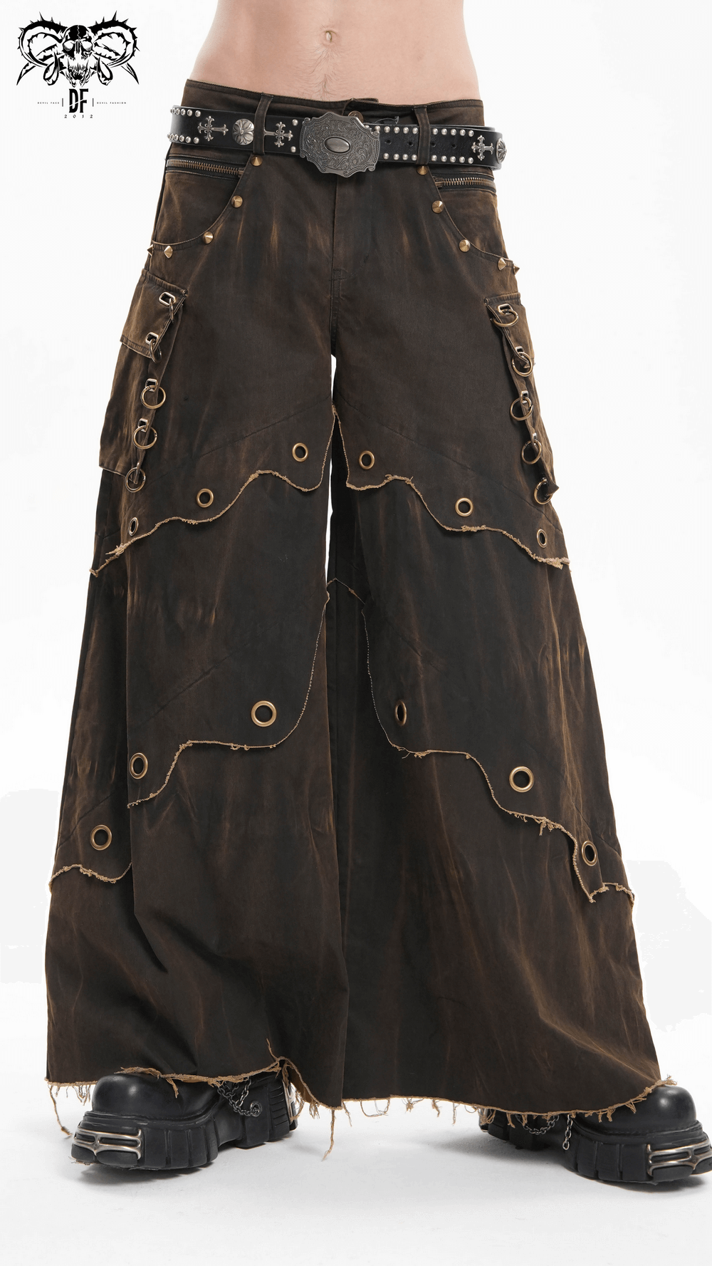 Distressed wide leg pants with grommets, raw hem, and pockets, perfect for a bohemian style statement.