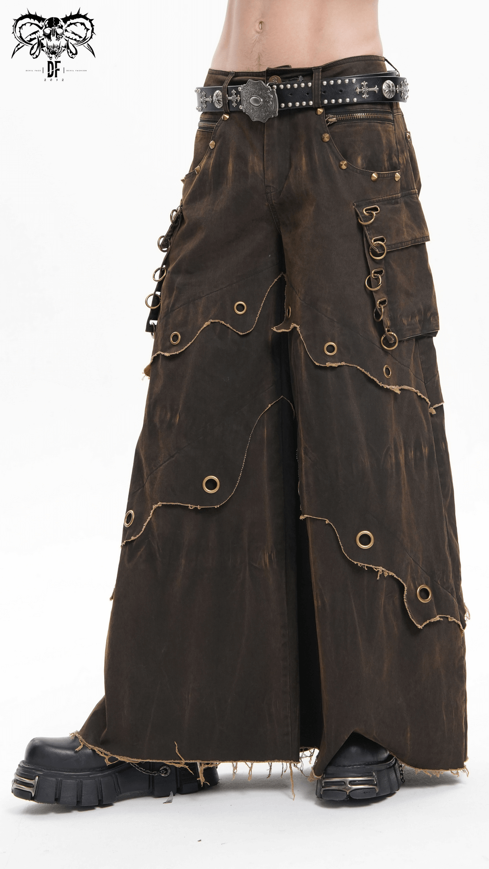 Distressed wide leg pants with grommets, raw hem, and pockets, showcasing a unique bohemian style for edgy outfits.