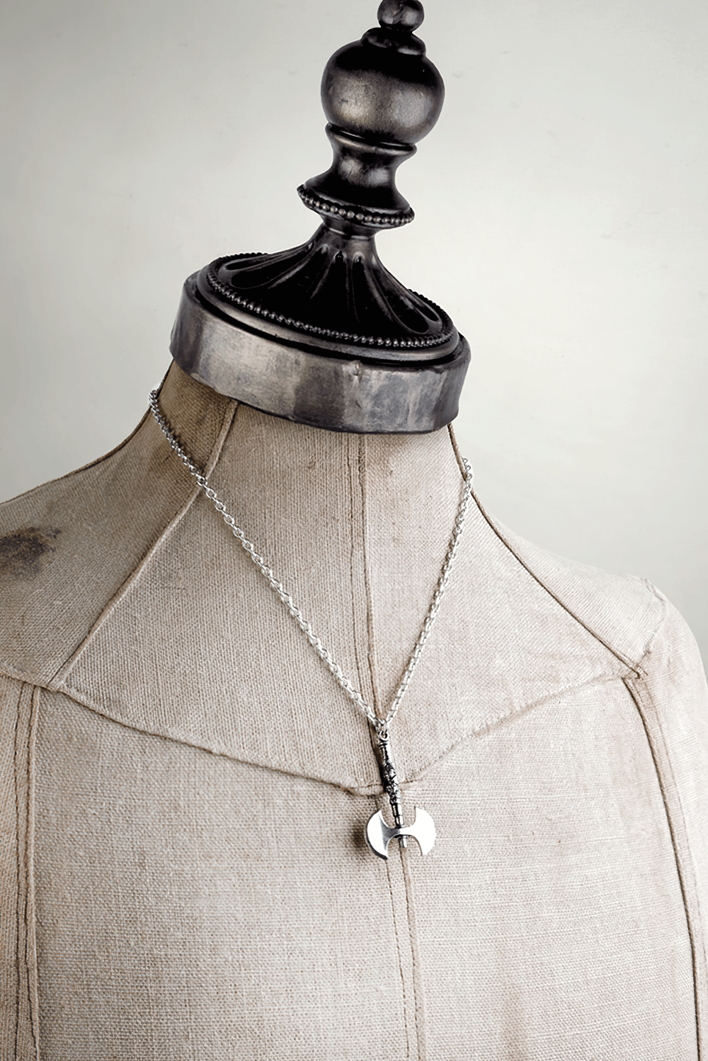 Double Axe Pendant in pewter displayed on a mannequin, showcasing its bold Viking-inspired design and craftsmanship.