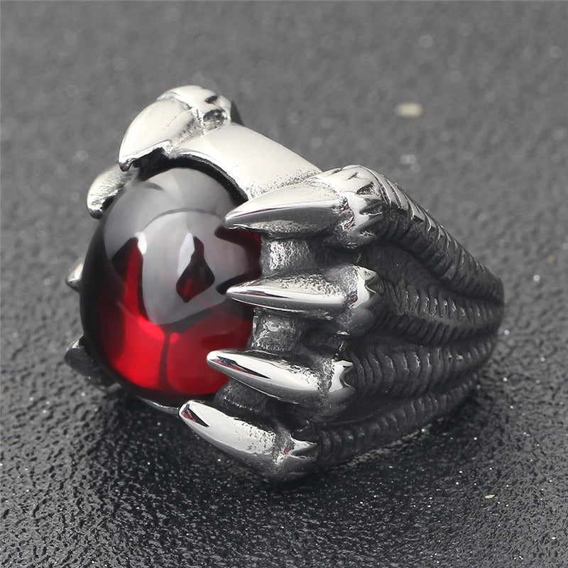 Dragon Claw stainless steel ring with red CZ stone, perfect for gothic jewelry lovers, showcasing fierce dragon design.