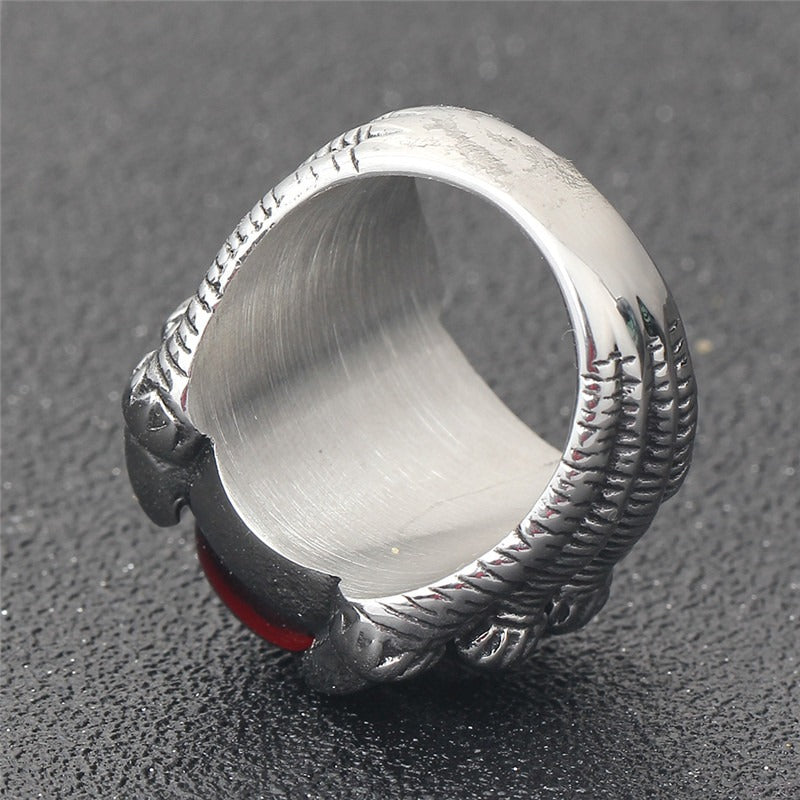 Dragon Claw stainless steel ring with red CZ stone, showcasing a gothic design. Perfect for alternative jewelry lovers.