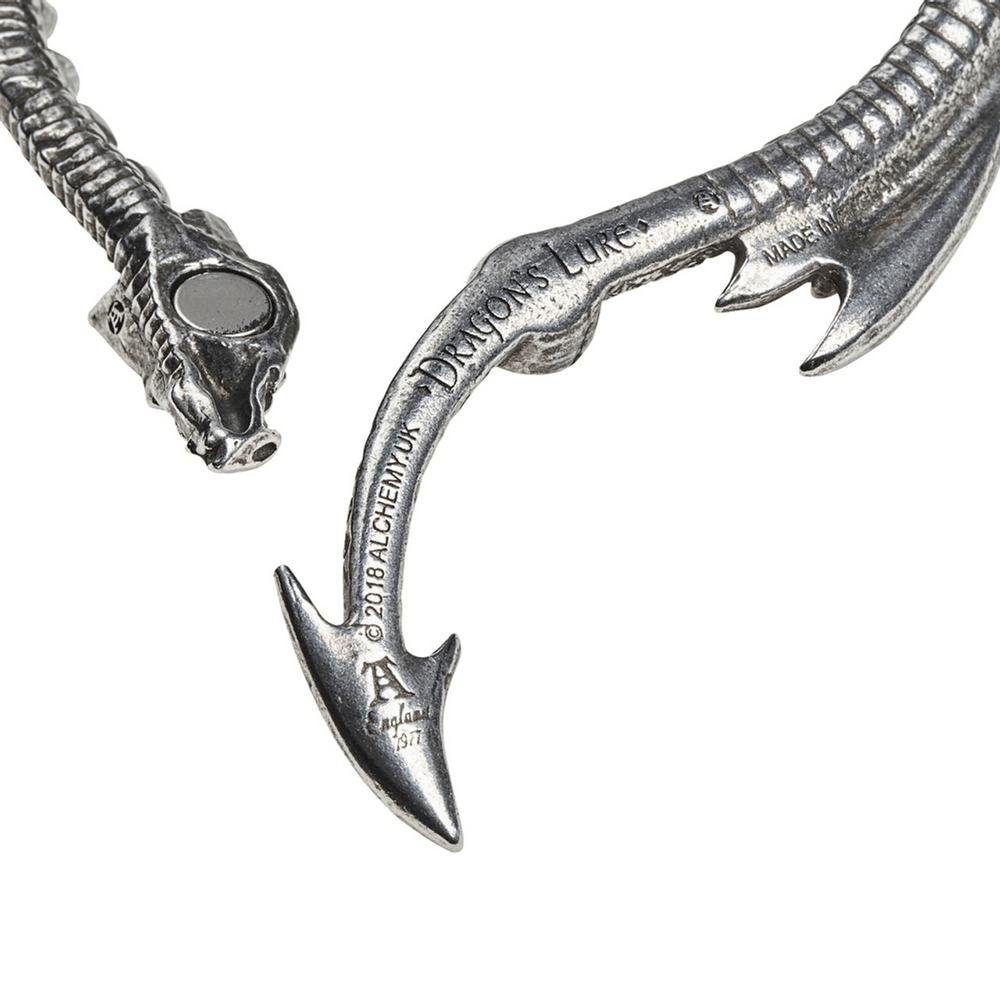 Close-up of Dragon Lure Necklace showing detailed pewter tail and magnetic catch, featuring spined design.