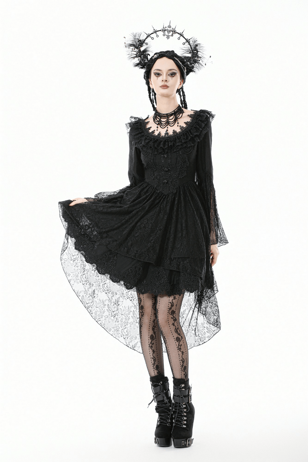 Dramatic Lace High Low Dress with Corset Back and Ruffles worn by a model, featuring lace overlay and flared sleeves.