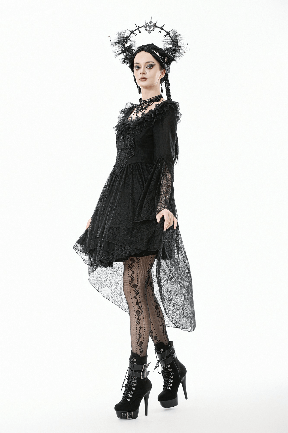 Dramatic Lace High Low Dress with Corset Back and Ruffles showcased on model with gothic style and dramatic accessories.