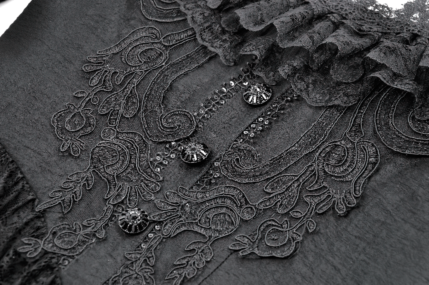 Close-up of the intricate detailing on the Dramatic Lace High Low Dress with Corset Back and Ruffles.