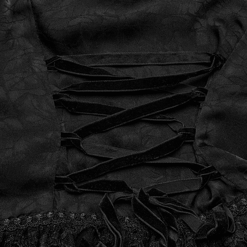 Close-up of the laced back of a black lace gothic blouse, showcasing elegant detailing and dramatic design.