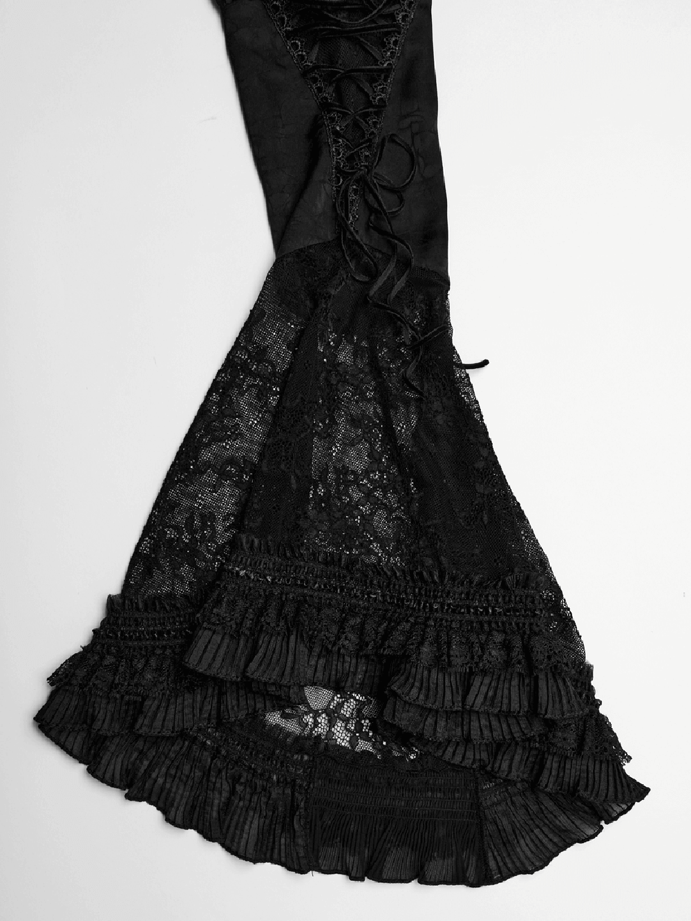 Dramatic black lace blouse with intricate lace overlay and flared bubble sleeves, embodying gothic elegance.
