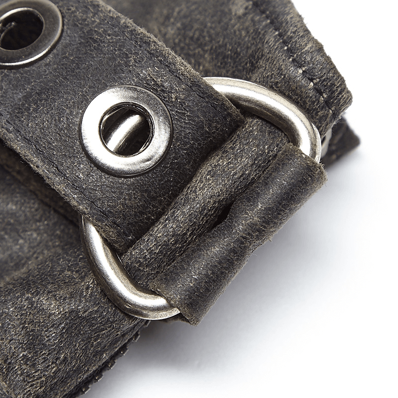 Close-up of durable steampunk-style leather gauntlet gloves with metal buckle and unique texture.