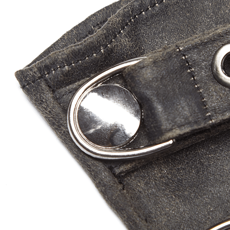 Close-up of the sturdy metal buckle and unique texture of the Steampunk-style leather gauntlet gloves.