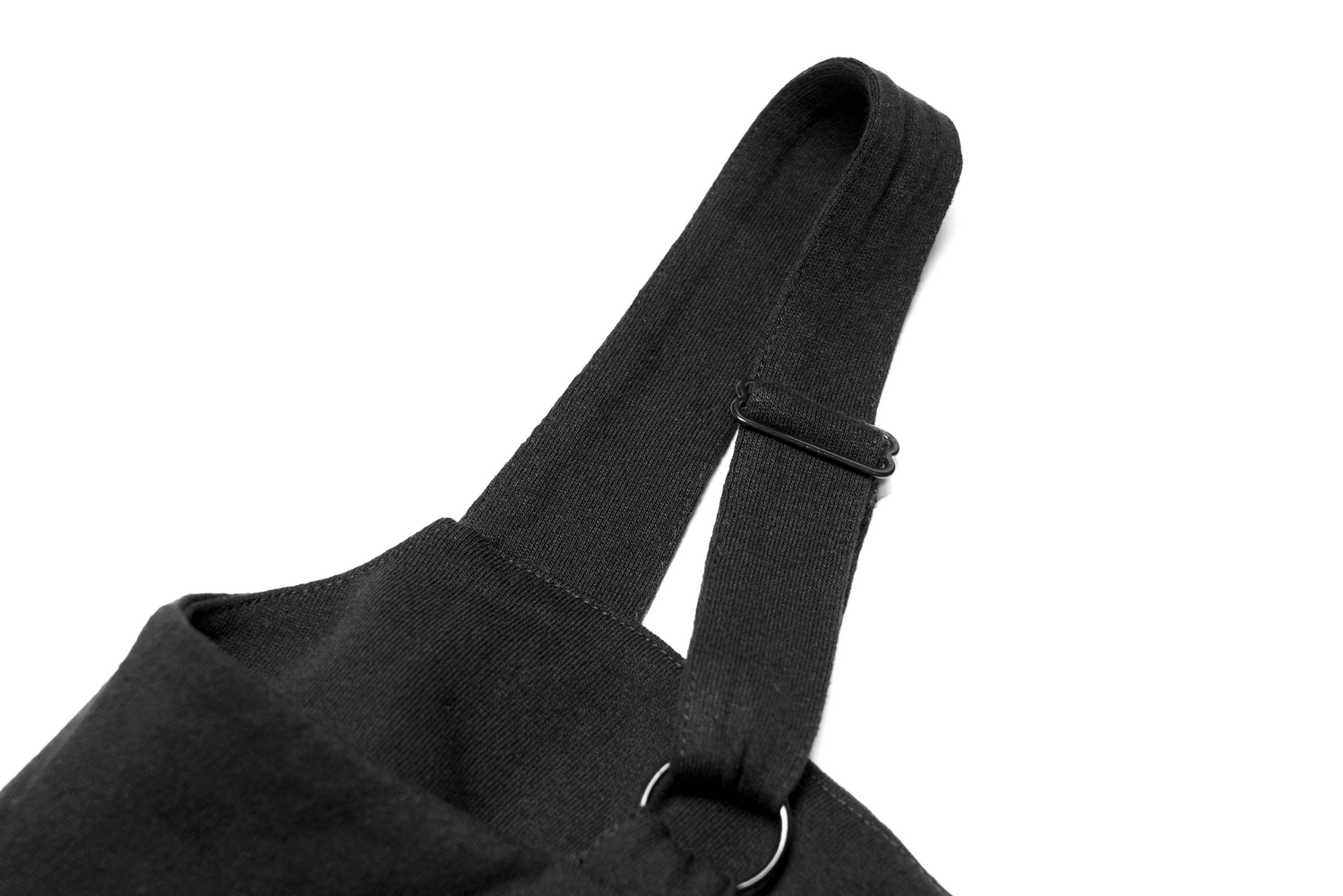 Close-up of black dress strap with metal hardware and adjustable buckle detail for a perfect fit.