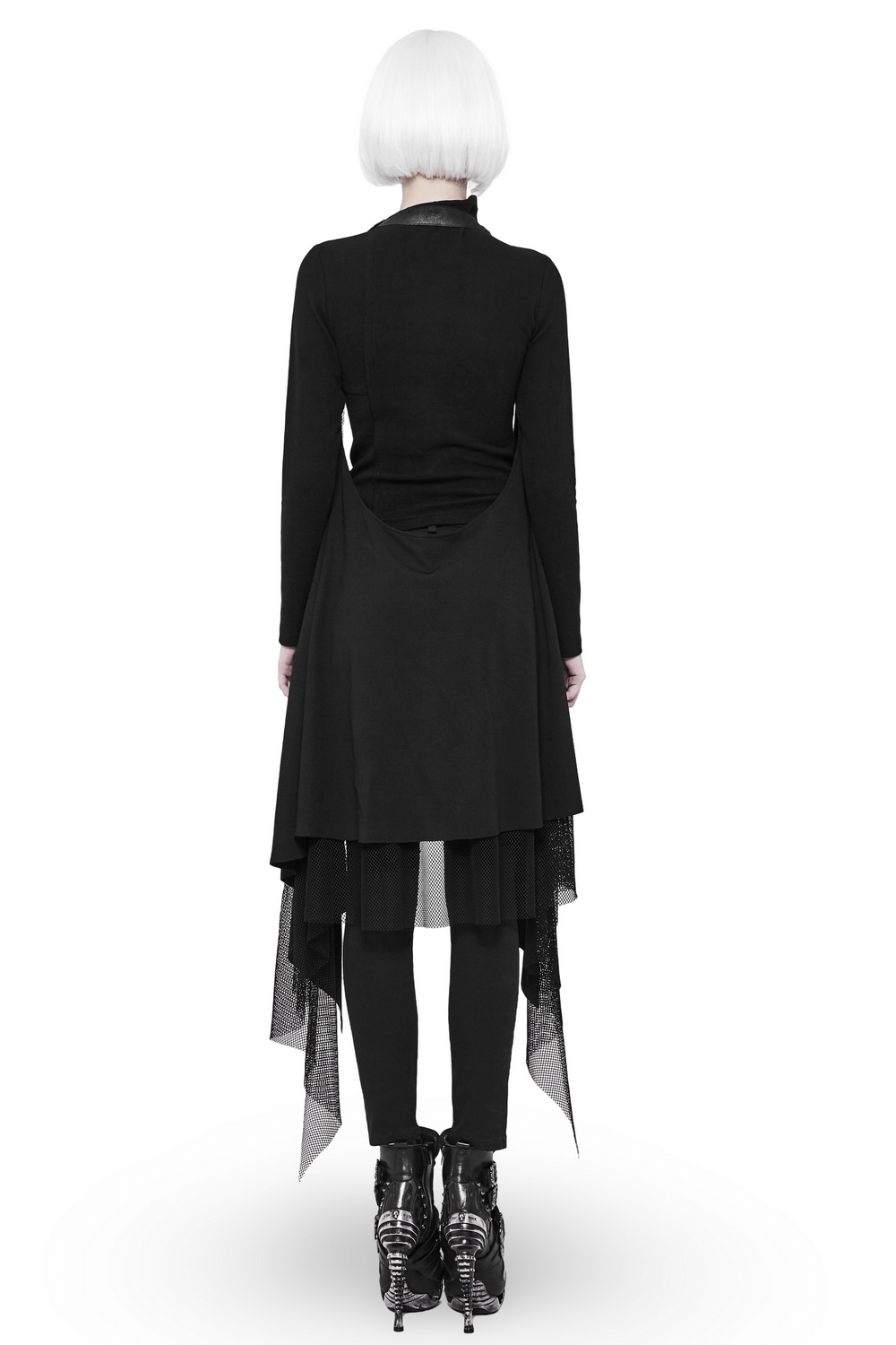 Back view of a woman in a gothic black asymmetrical cape with lace trim and stylish boots.