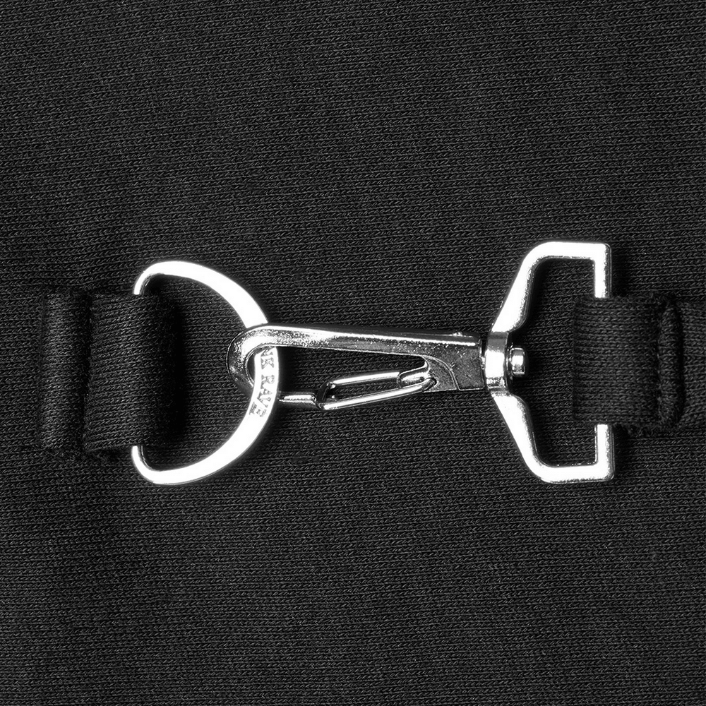 Close-up of a silver zipper and clasp on a black crop hoodie with devil horns.