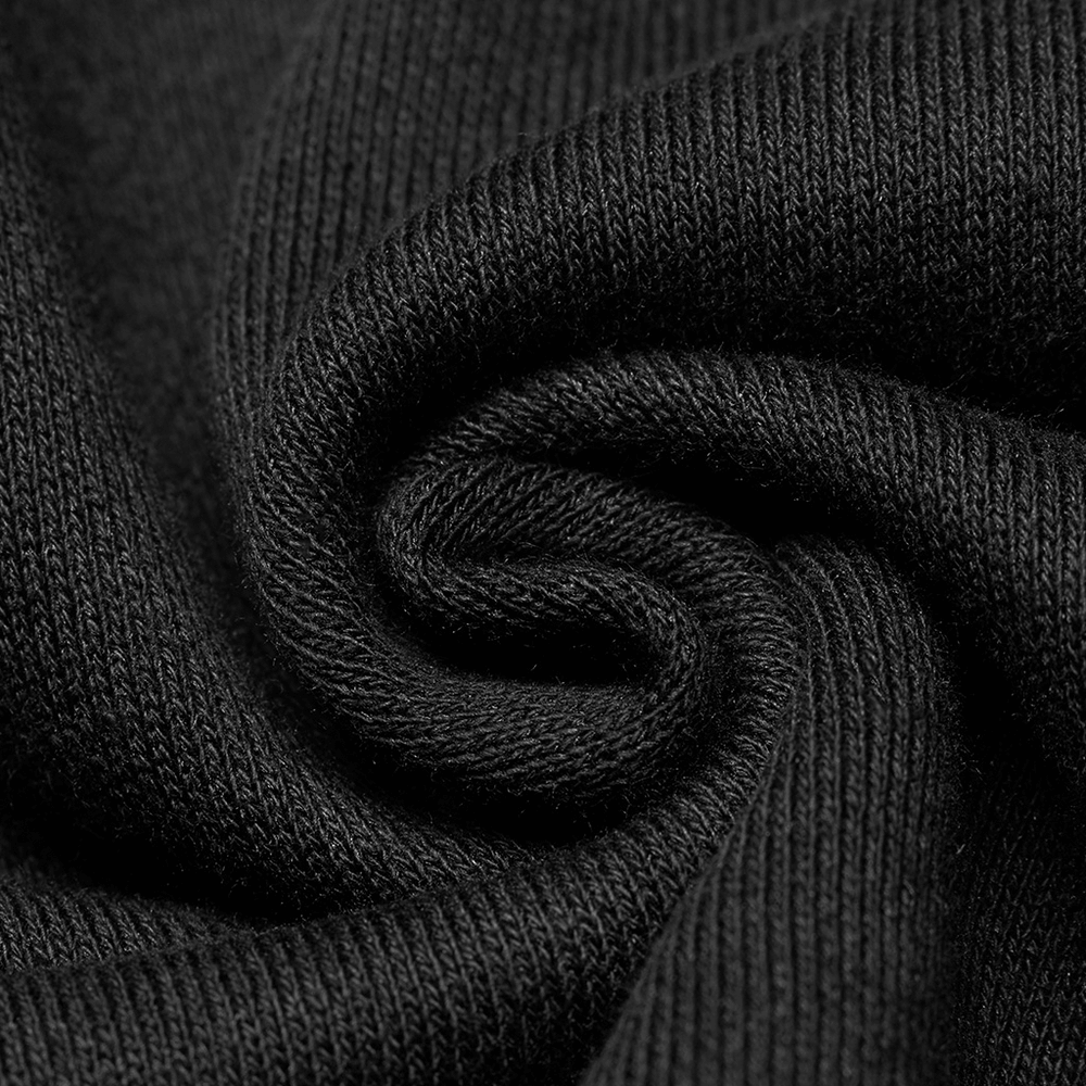 Close-up of soft black fabric, perfect for an edgy black crop hoodie with devil horns and tail.
