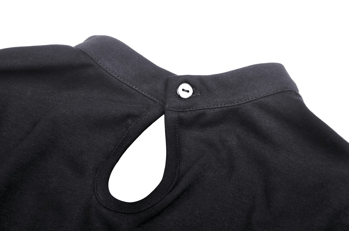 Close-up of the back neckline of an edgy black top with a keyhole detail and button closure.
