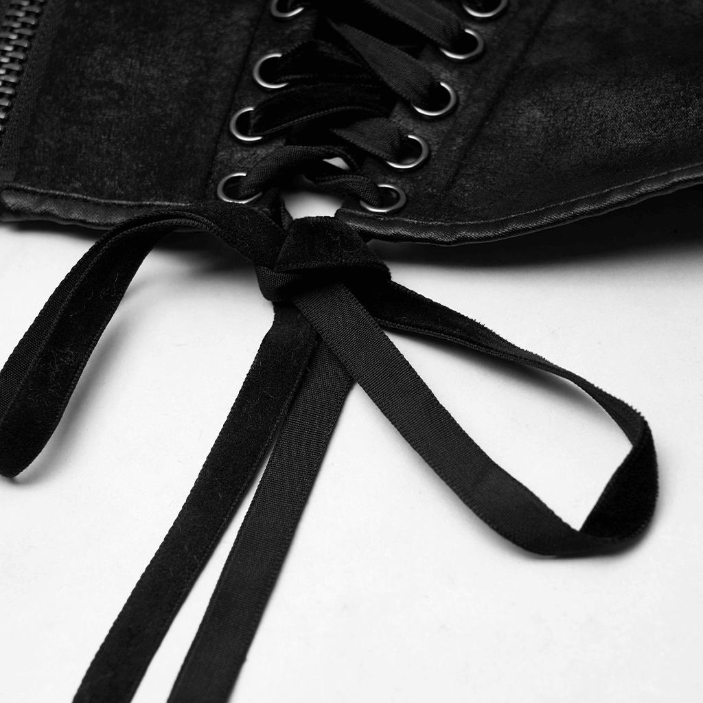 Close-up of a black gothic corset belt featuring lace-up detailing and a sturdy zipper.
