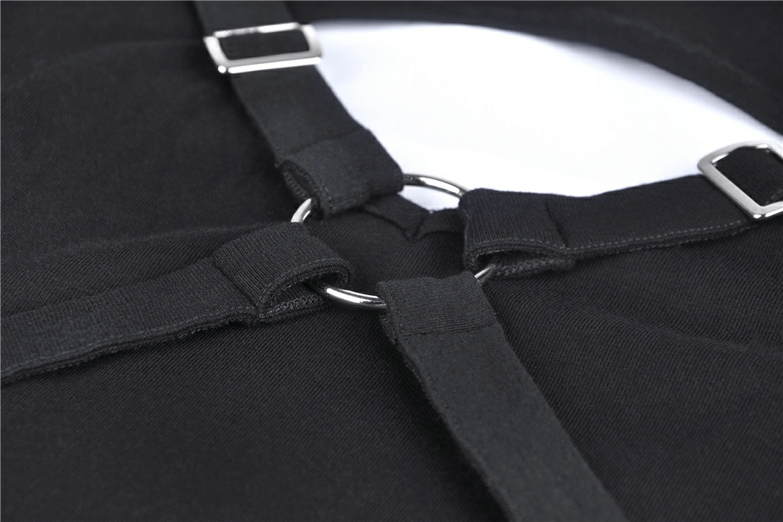 Close-up of an edgy black hoodie featuring metal accents and shredded detail for a punk-inspired style.