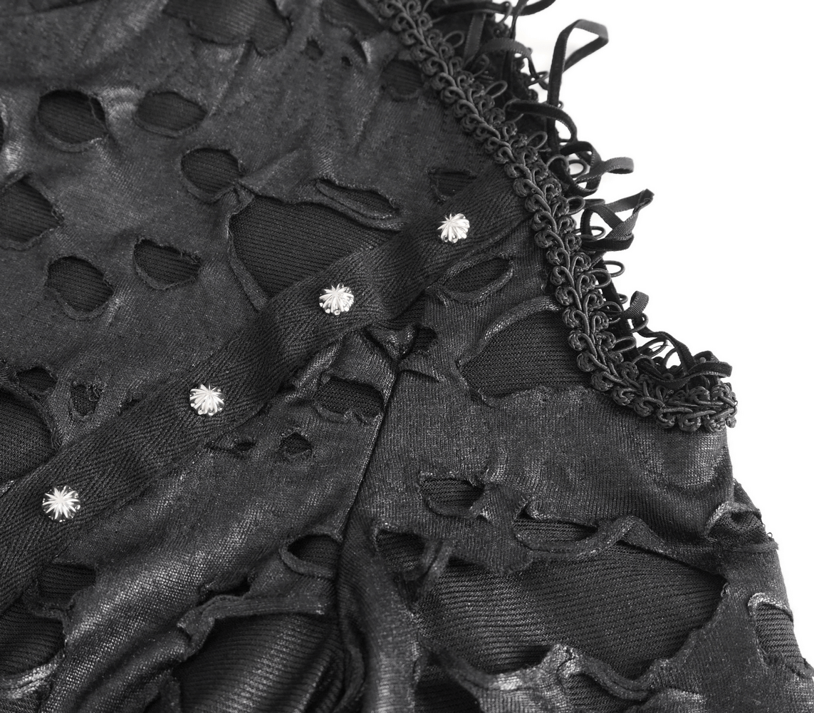 Close-up of edgy black distressed fabric with decorative buttons, perfect for a gothic hooded coat.