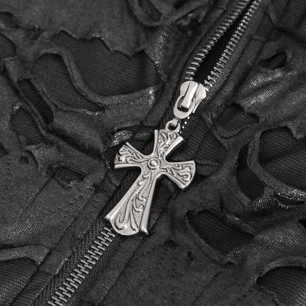 Close-up of zipper with ornate cross charm on edgy black distressed coat highlighting gothic style.