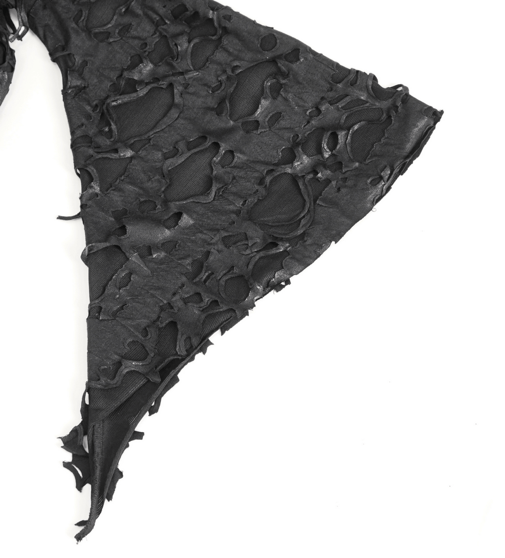 Close-up of the edgy black distressed fabric featuring unique irregular cut-outs for a gothic trench coat.
