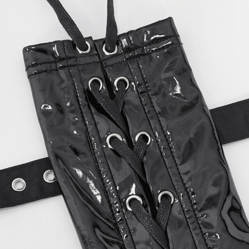 Close-up of black lace-up fingerless gloves with buckles, showcasing glossy material and intricate design details.