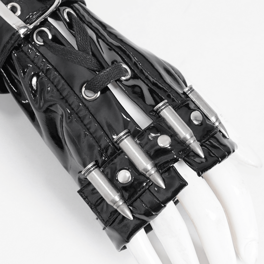 Close-up of edgy black lace-up fingerless gloves with metallic buckles and sleek design, perfect for gothic fashion.