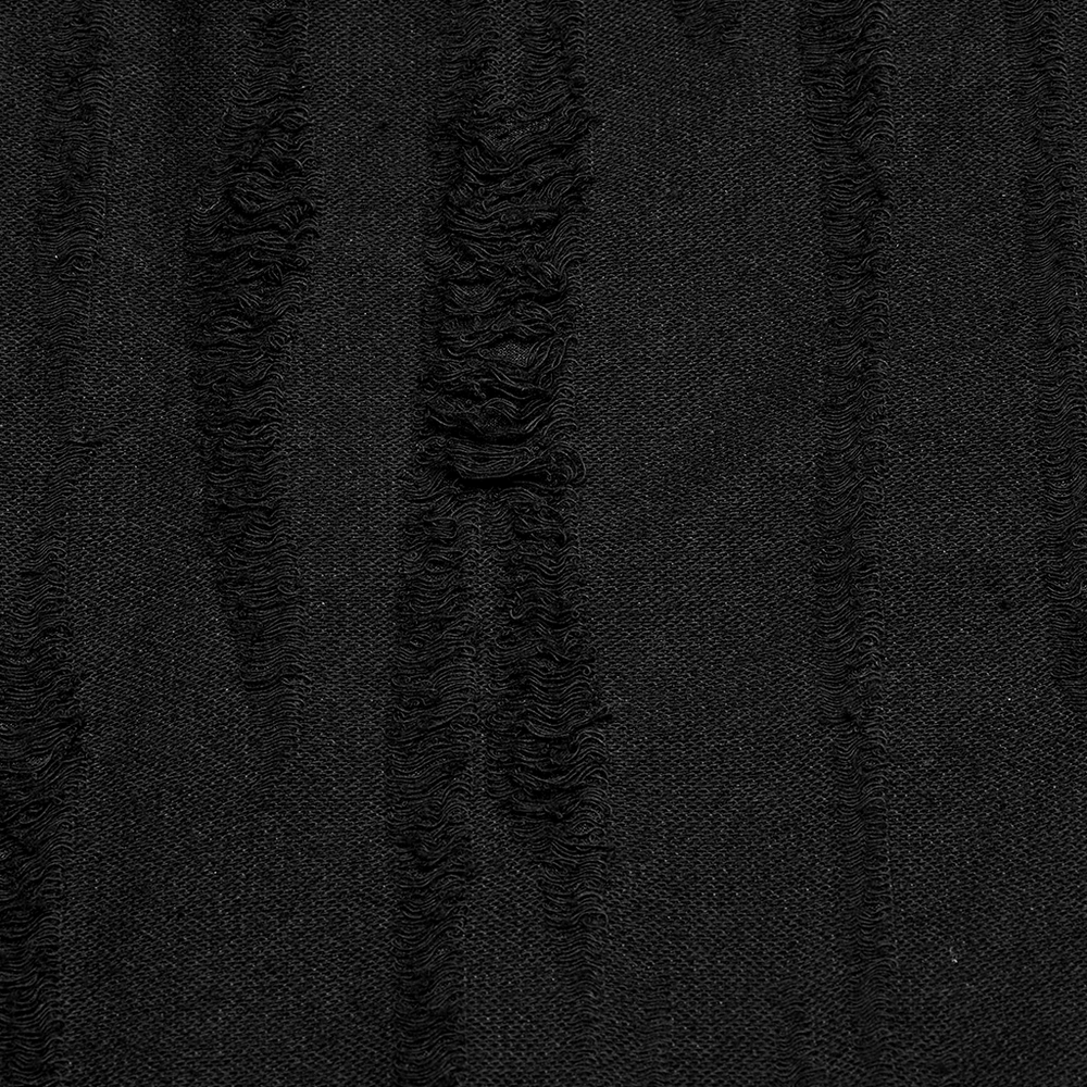 Close-up of distressed black knit fabric texture from edgy streetwear top fabric detail.