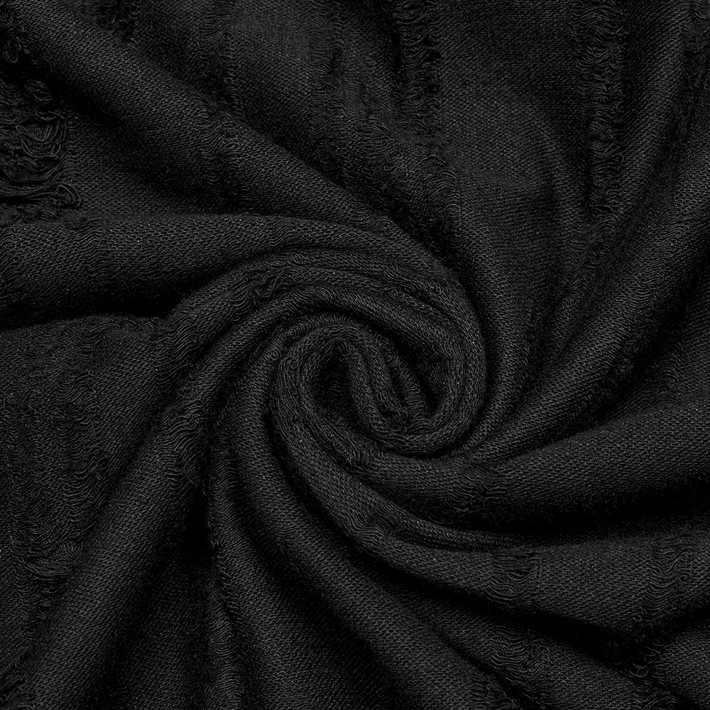 Close-up of tattered black knit fabric showing distressed texture in a swirl, capturing edgy punk streetwear vibes.