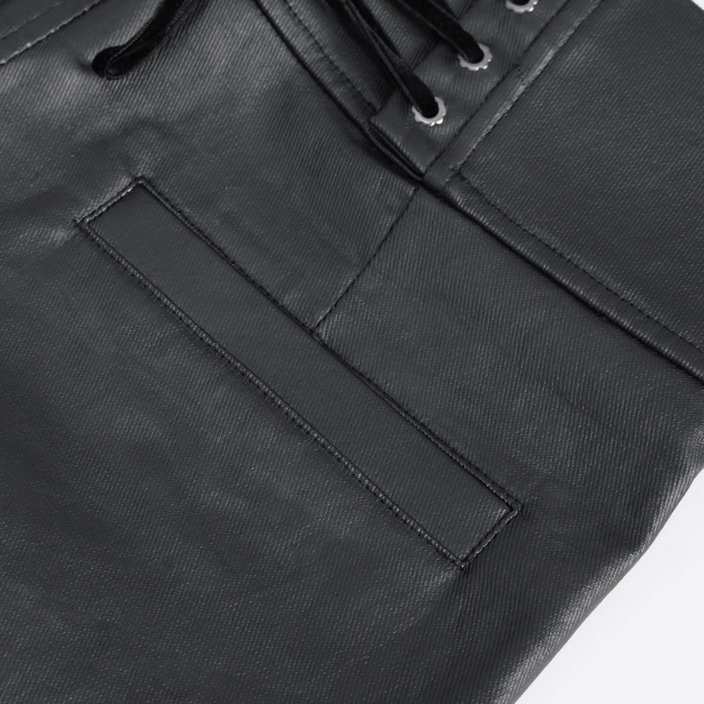 Close-up of black zippered pants with lace-up detail and pocket, perfect for an edgy look and rock-and-roll style.