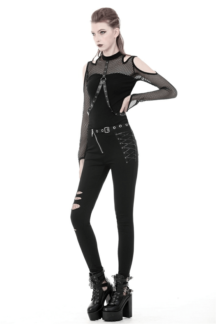 Gothic inspired black mesh cold shoulder top with stud details and edgy ripped leggings, perfect for standout style.